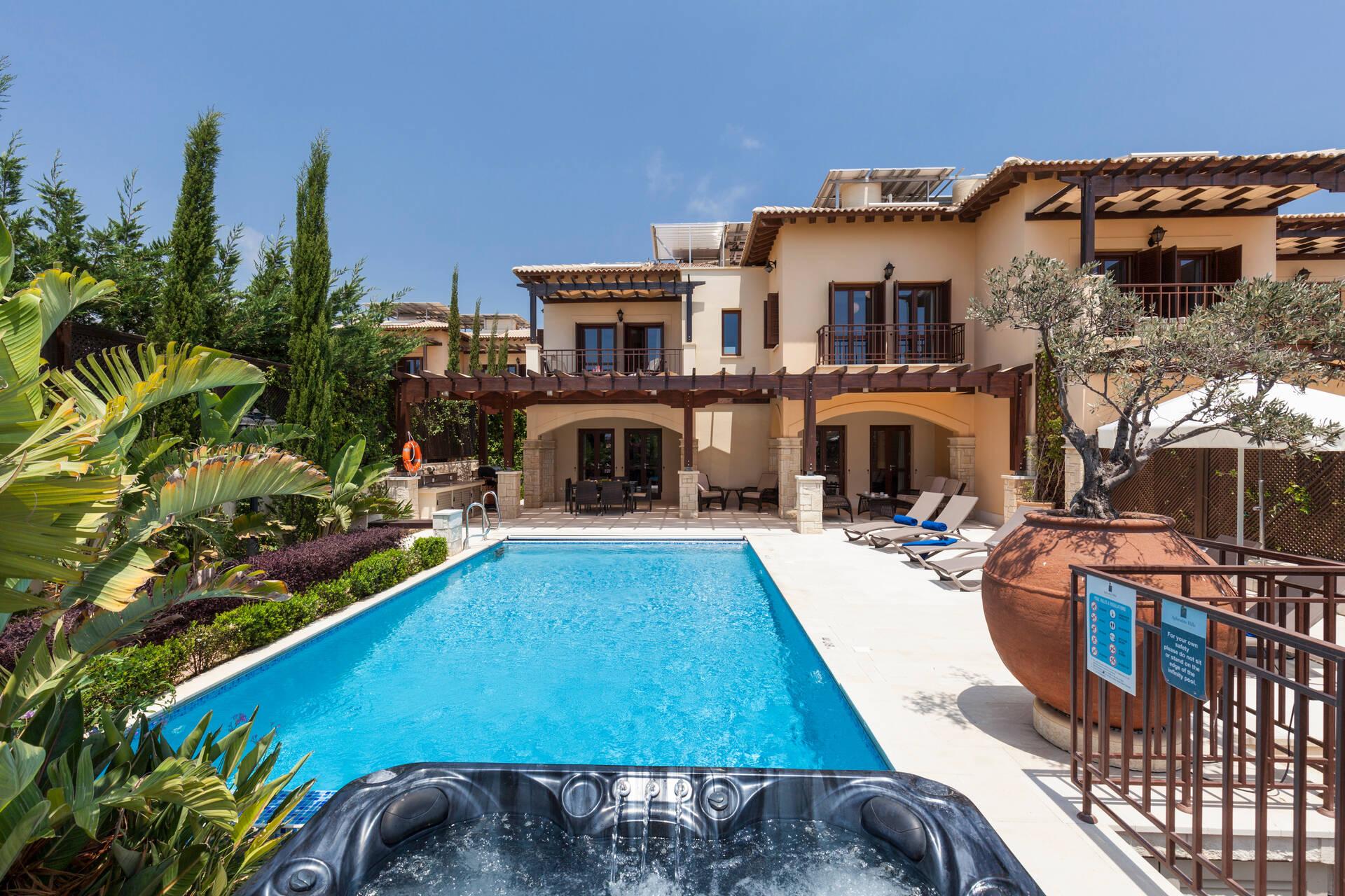 Overhead view of an outdoor swimming pool at Aphrodite Hills Resort