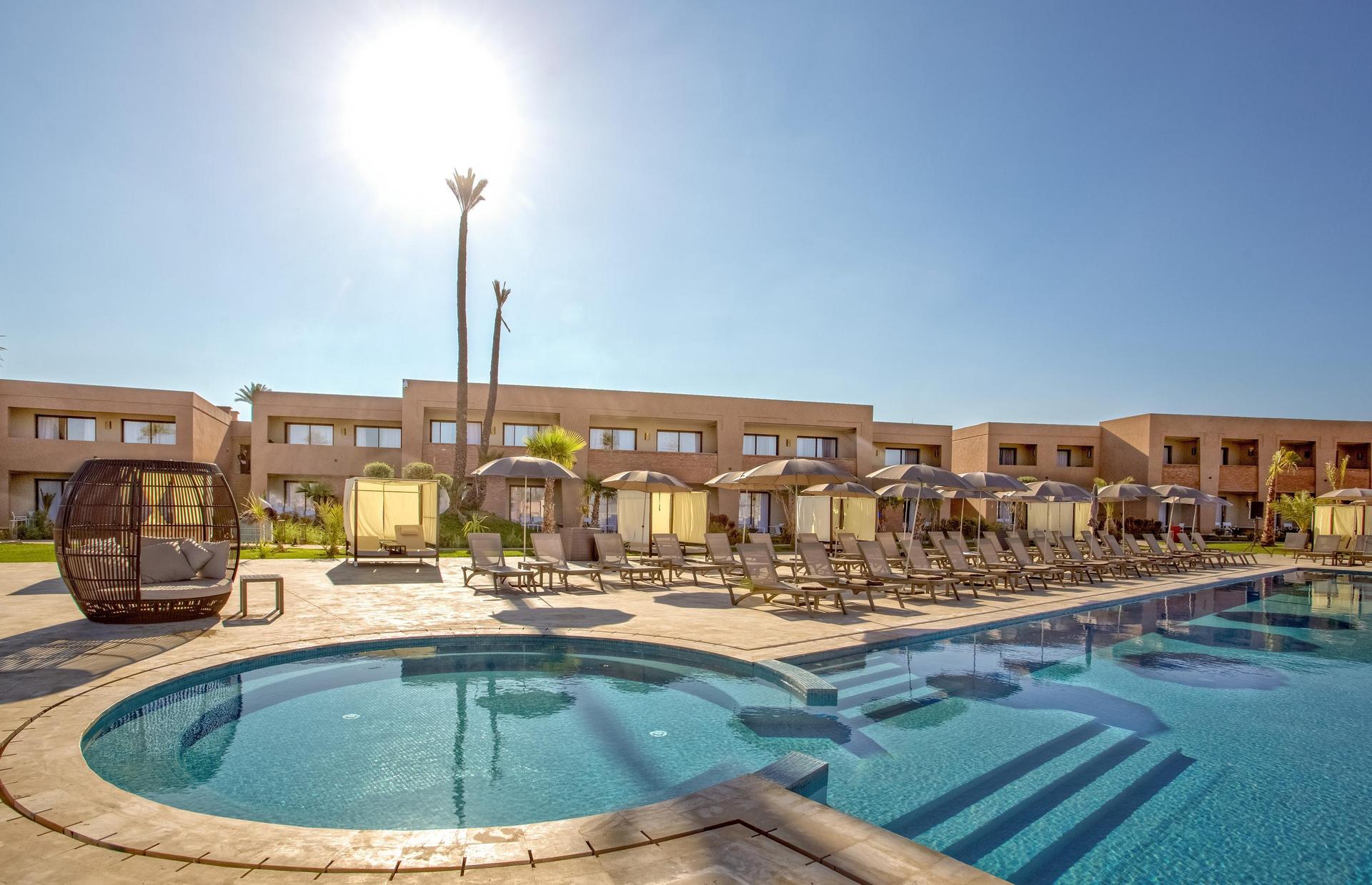 Outdoor swimming pool at the Be Live Collection