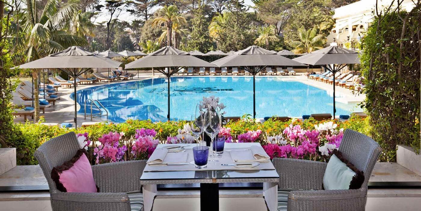 Poolside dining at the Palacio Estoril Golf & Spa Hotel