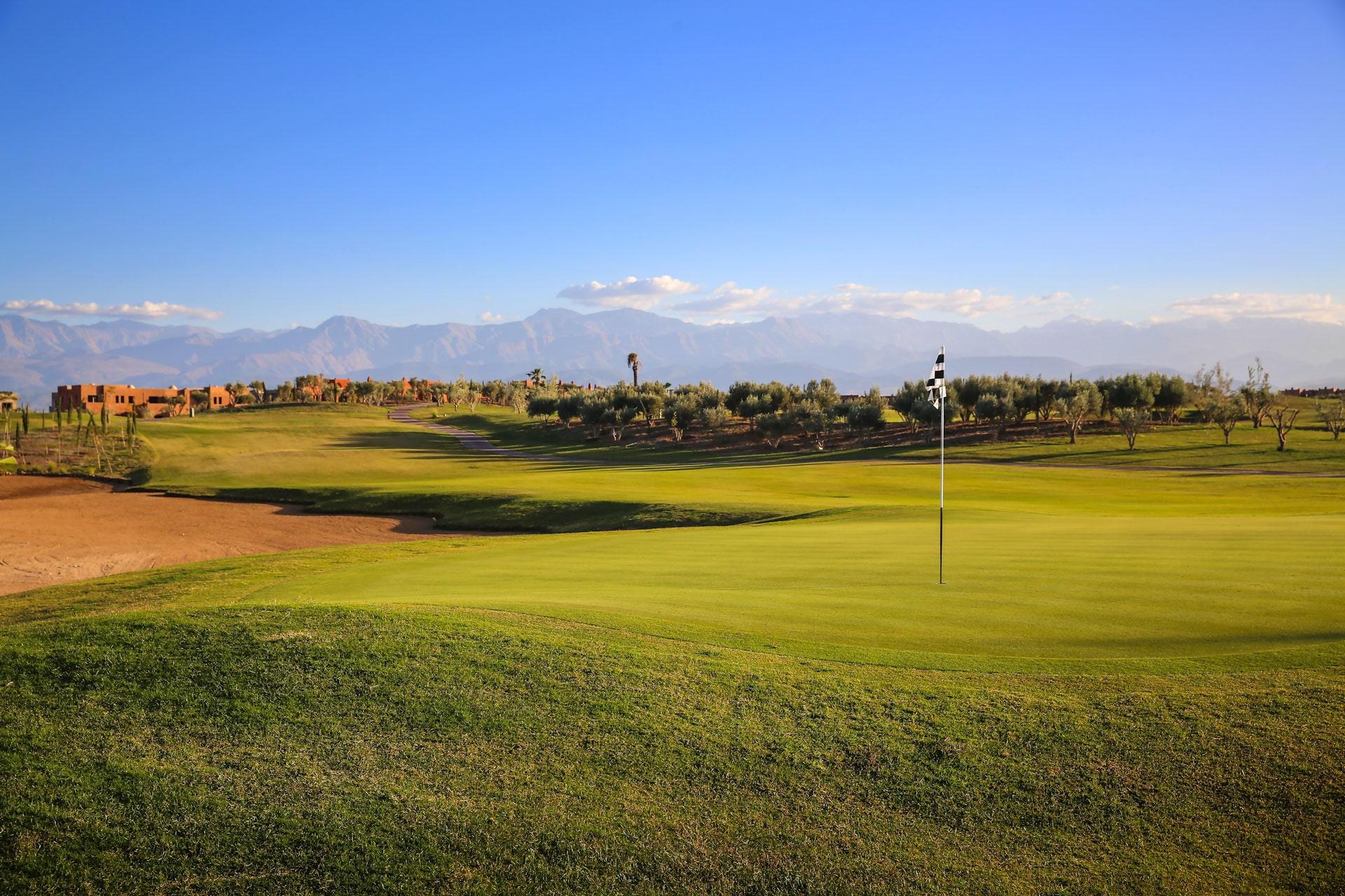 A well maintained fairway leading to a smooth green