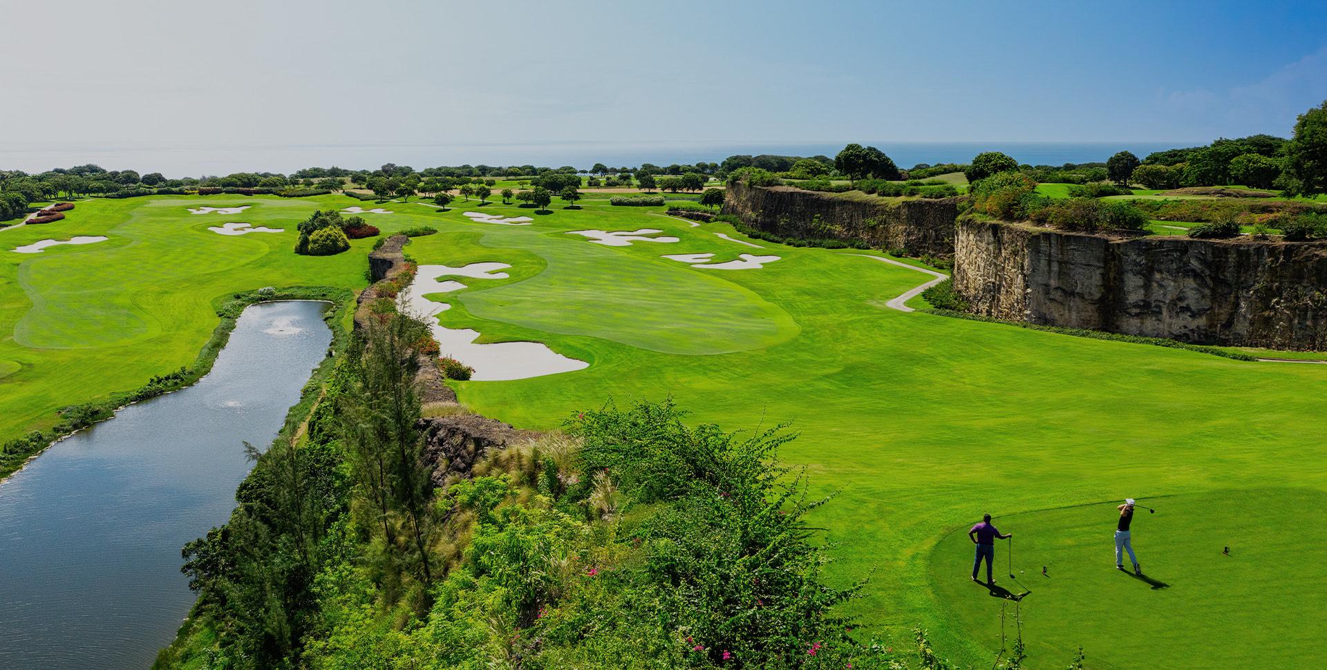 A well maintained fairway littered with sand bunkers at Sandy Lane