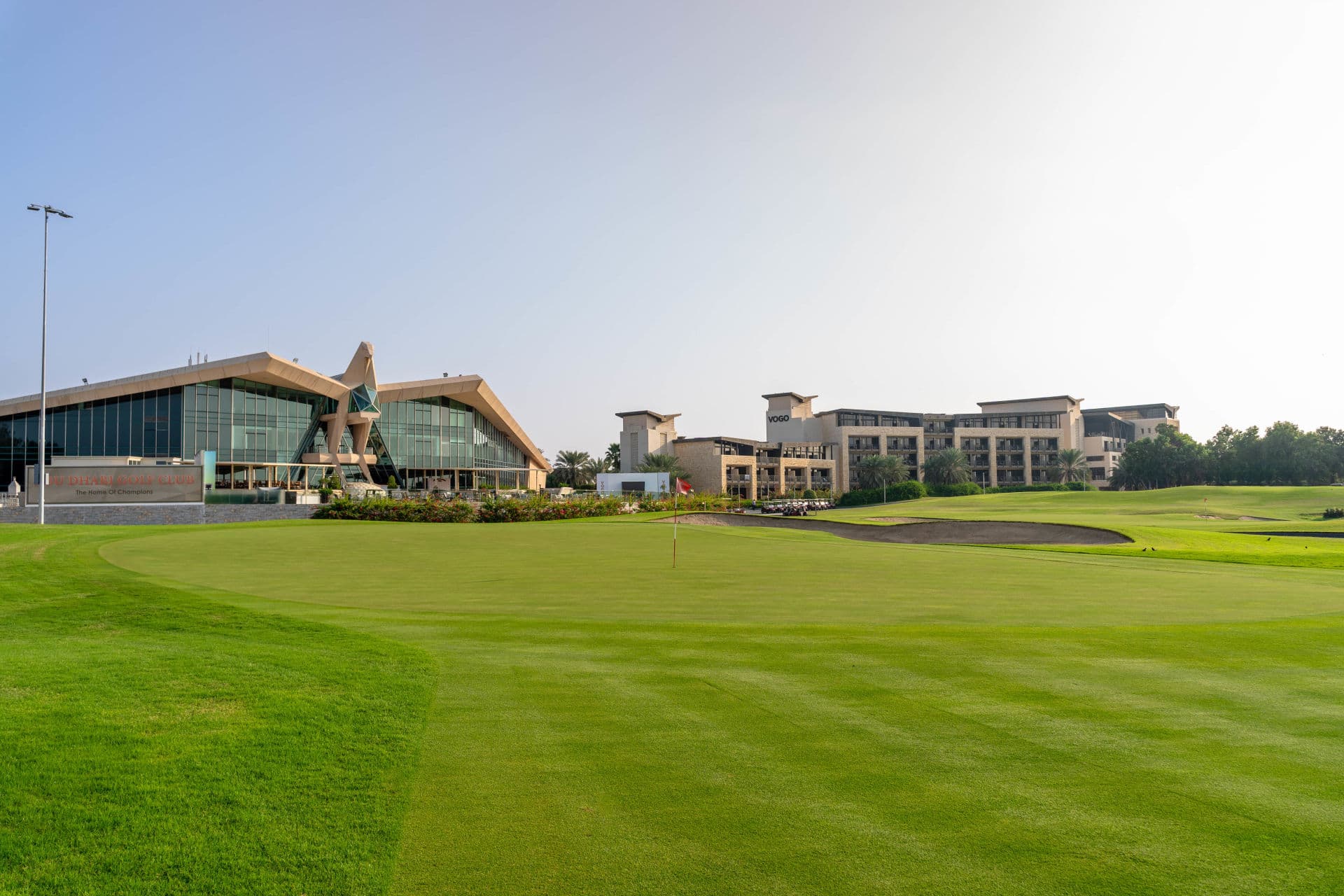 The VOGO Abu Dhabi Golf Resort & Spa buildinng overlooking the course