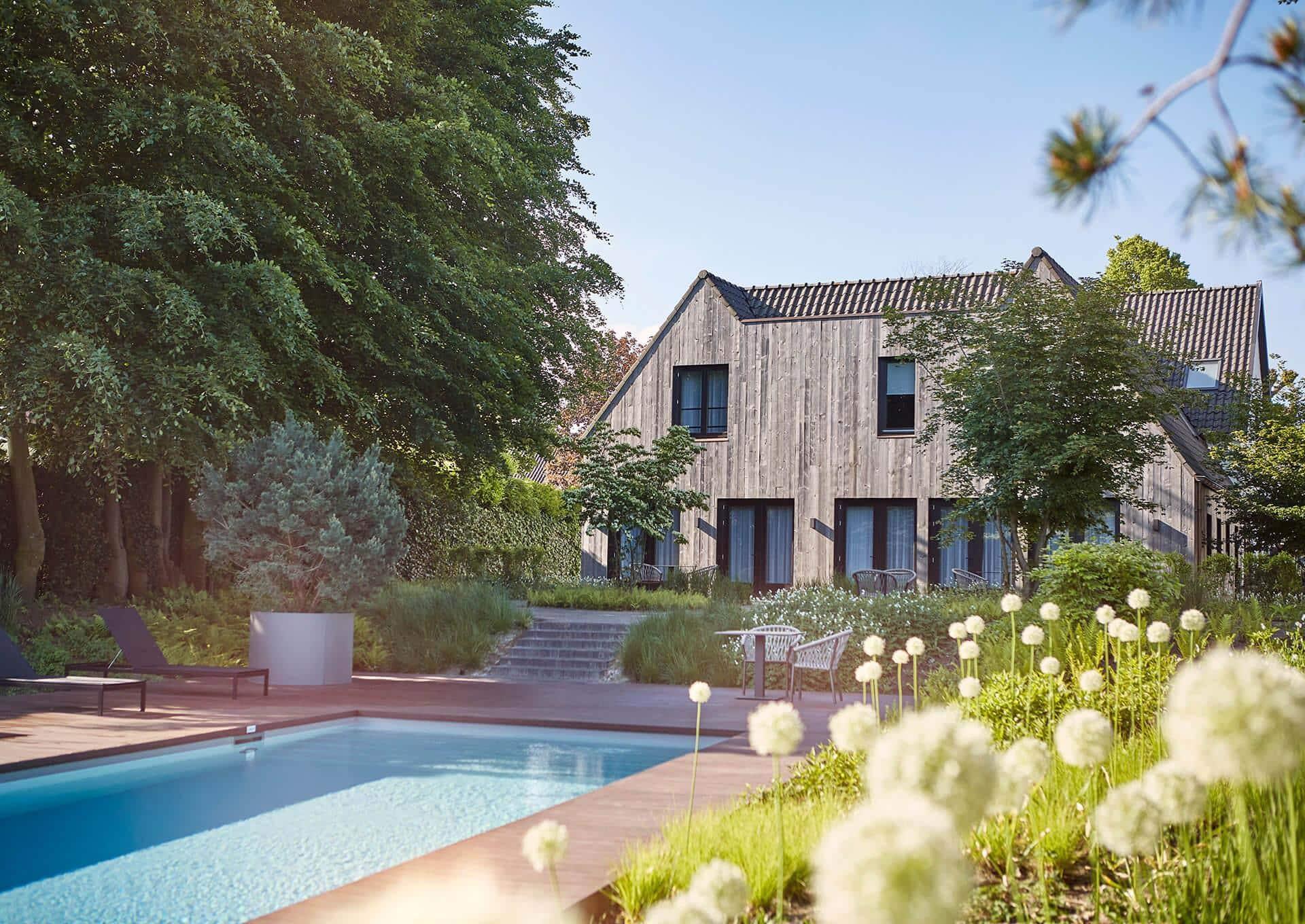 Exterior view of a villa at the Bernardus Lodge and private outdoor pool