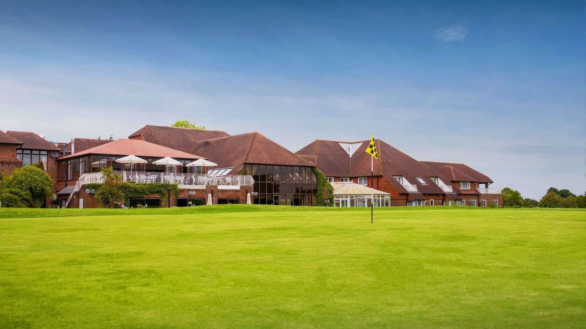Smooth green with the resort behind