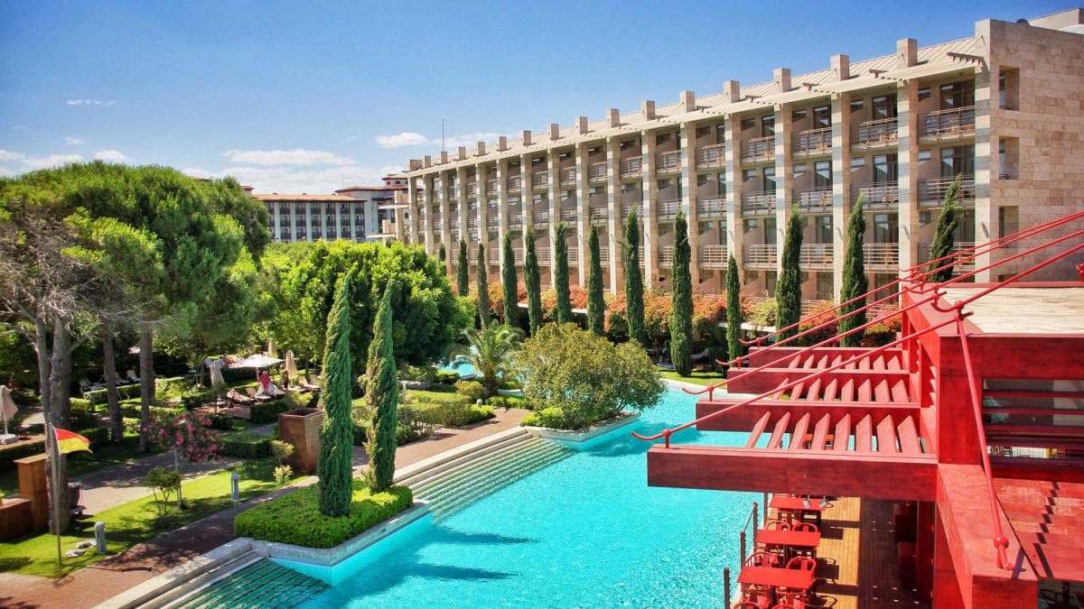 Outdoor view of the Gloria Serenity Resort with a view of the swimming pool