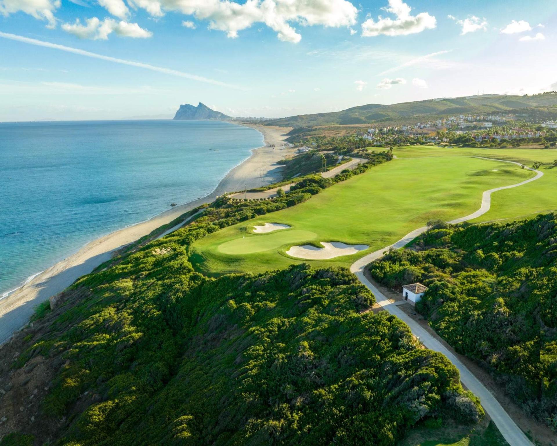 A well maintained coastal fairway nestled with sand bunkers
