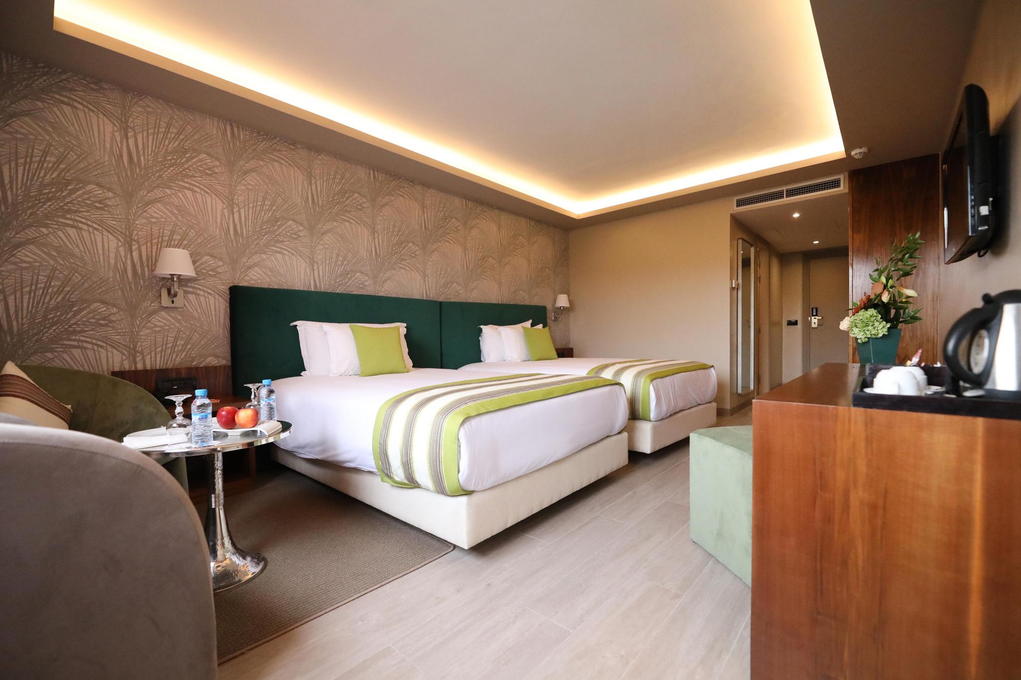 Twin double bed suite at the Kenzi Farah Rose Garden
