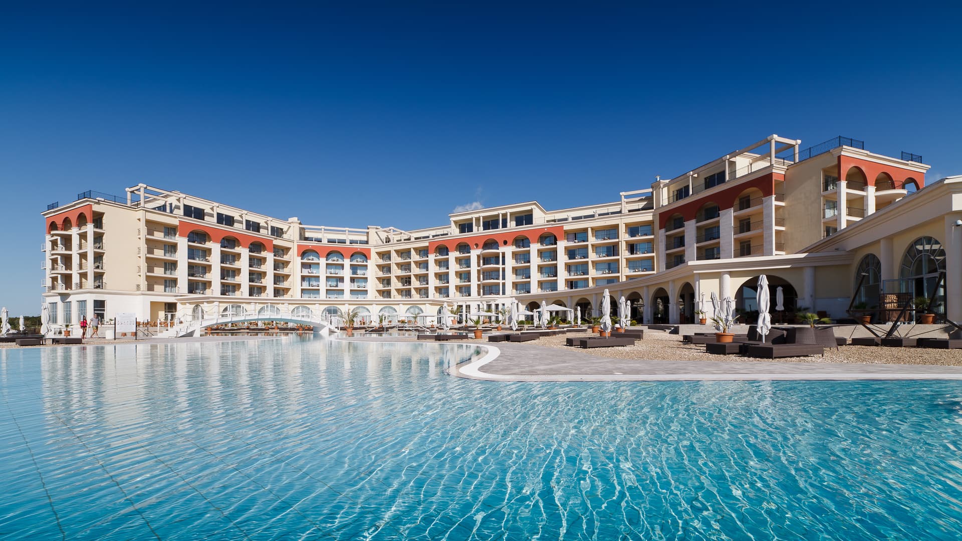 Panoramic view of the Lighthouse Golf & Spa Resort overlooking the outdoor swimming pool