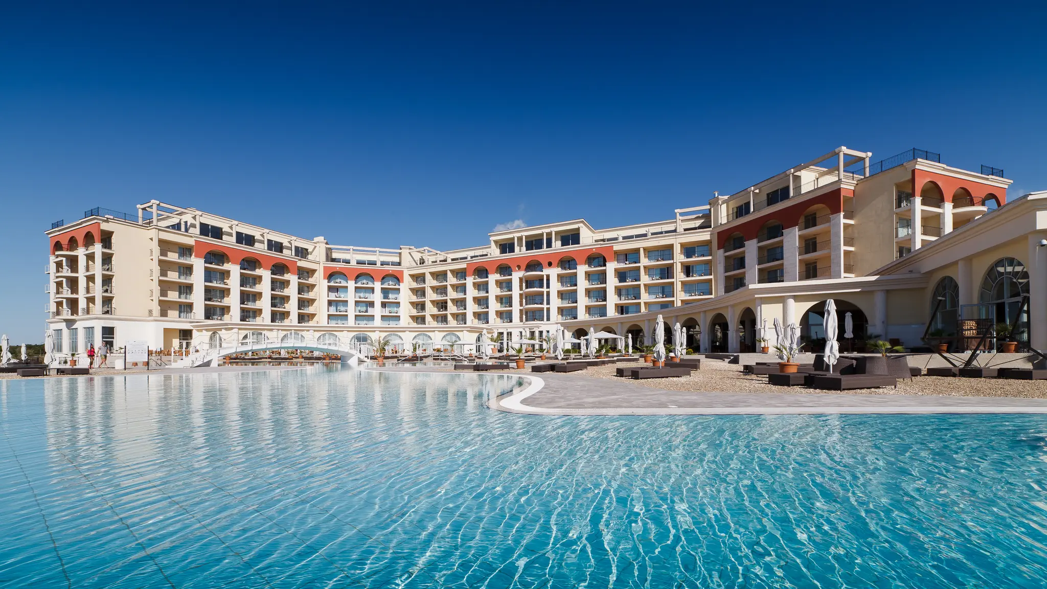 Panoramic view of the Lighthouse Golf & Spa Resort overlooking the outdoor swimming pool