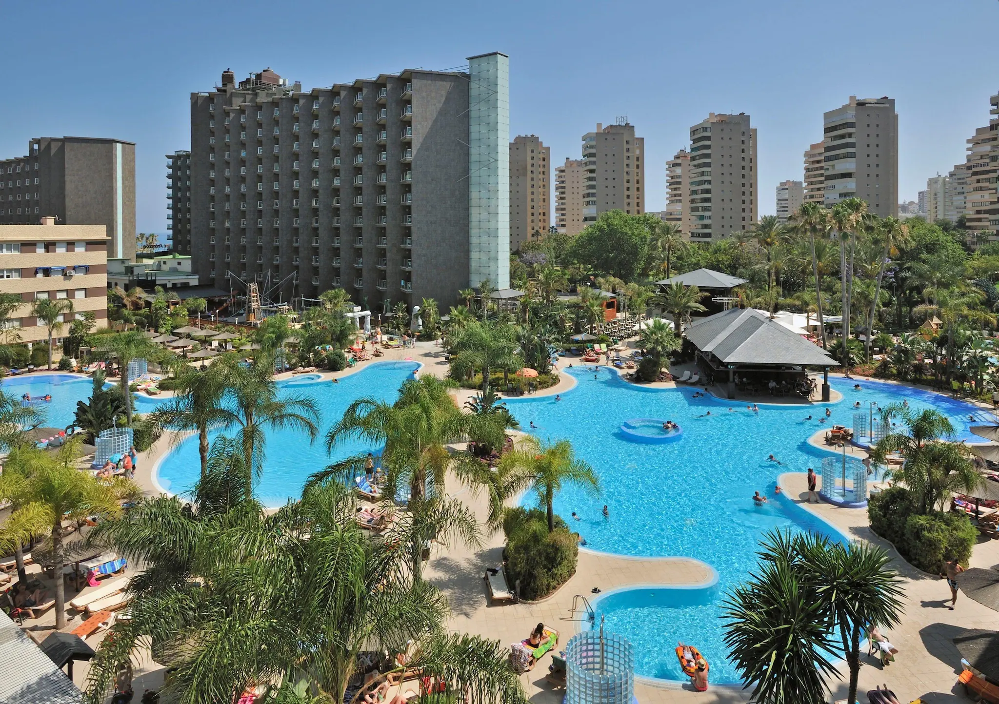 Panoramic view of the Melia Sol Principe building overlooking the outdoor swimming pool