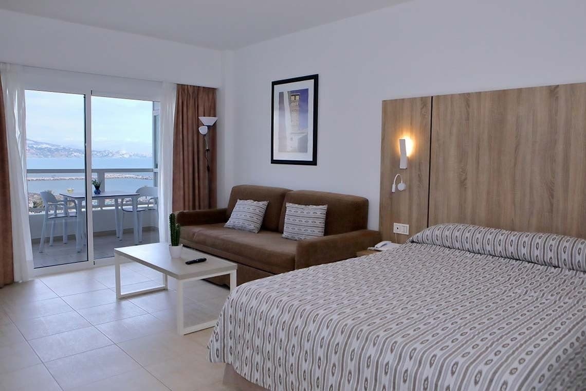 Double bed room with balcony views at the PYR Fuengirola