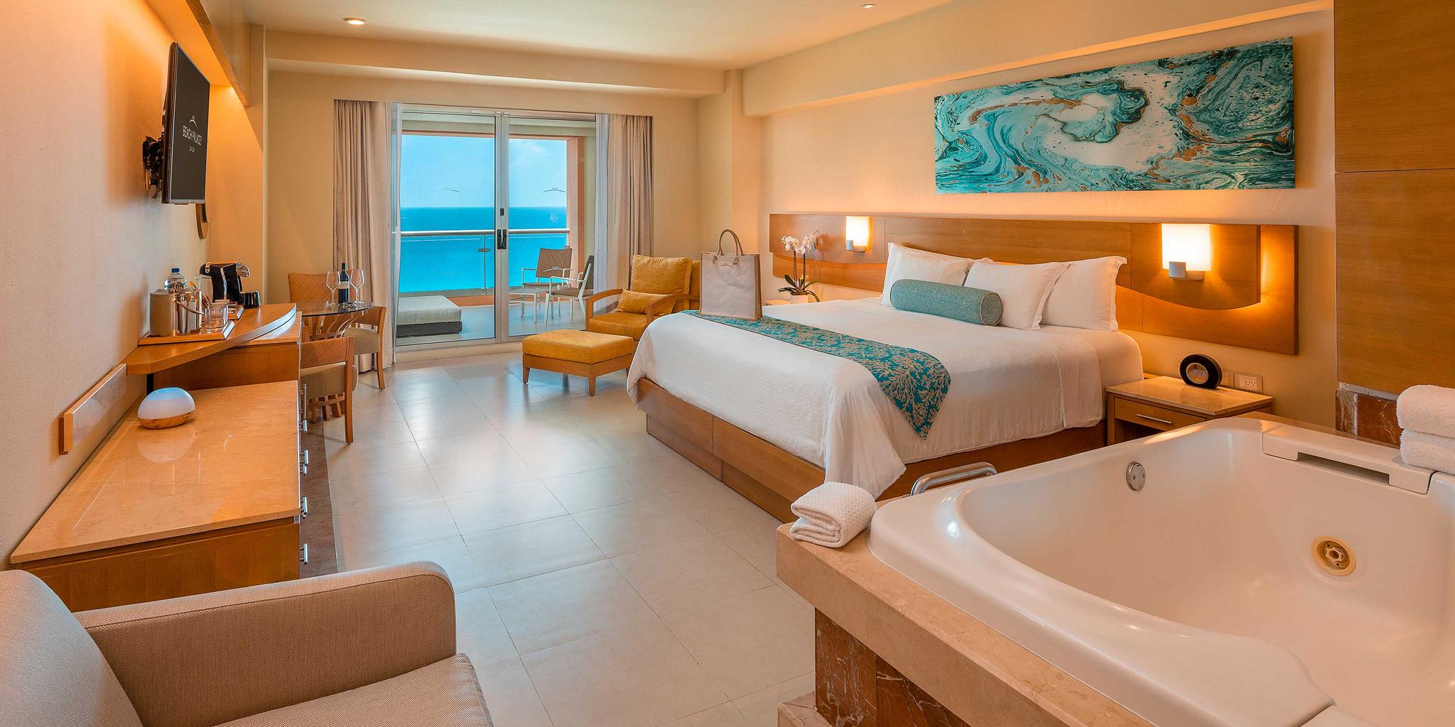 Double bed room at Palace Resorts with a open plan bathroom