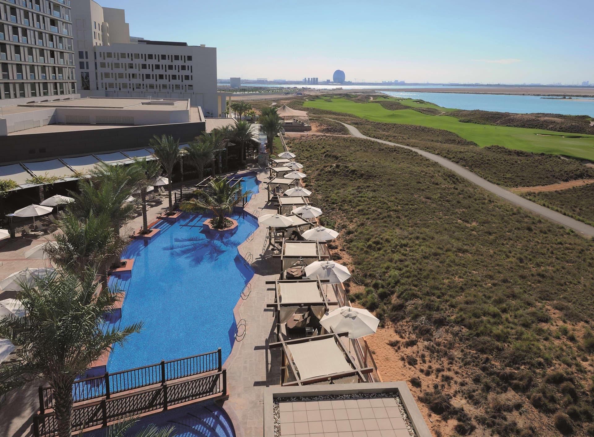 Aerial view of the outdoor swimming pool at Radisson Blu Hotel Abu Dhabi Yas Island