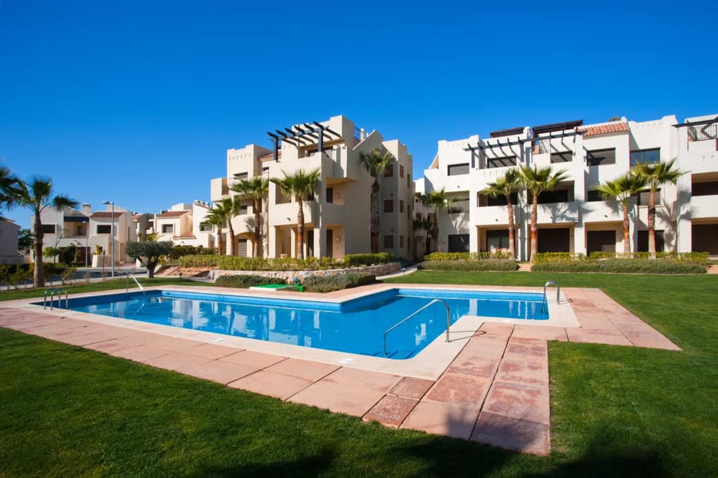 Panoramic view of the Roda Golf & Beach Resort outdoor swimming pool