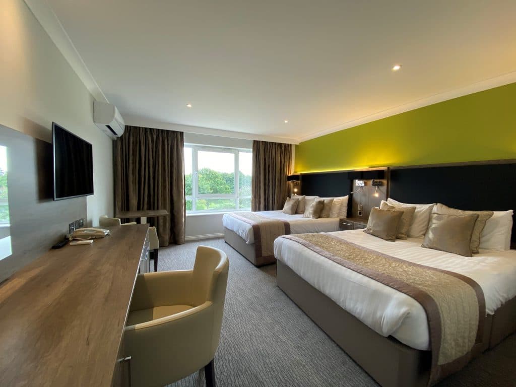 Bedroom in the hotel with two double beds