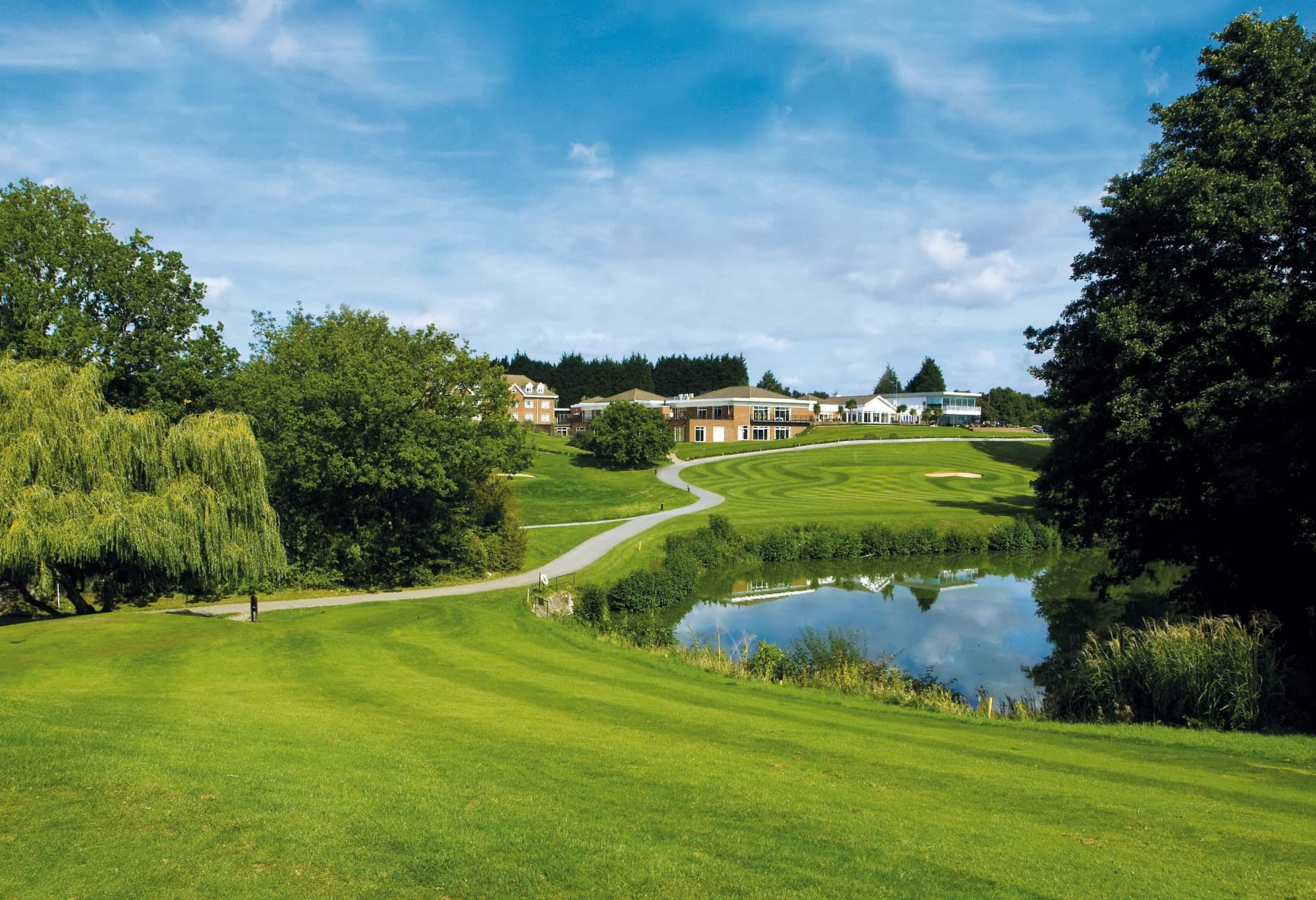 Hole leading over a water hazard towards the green