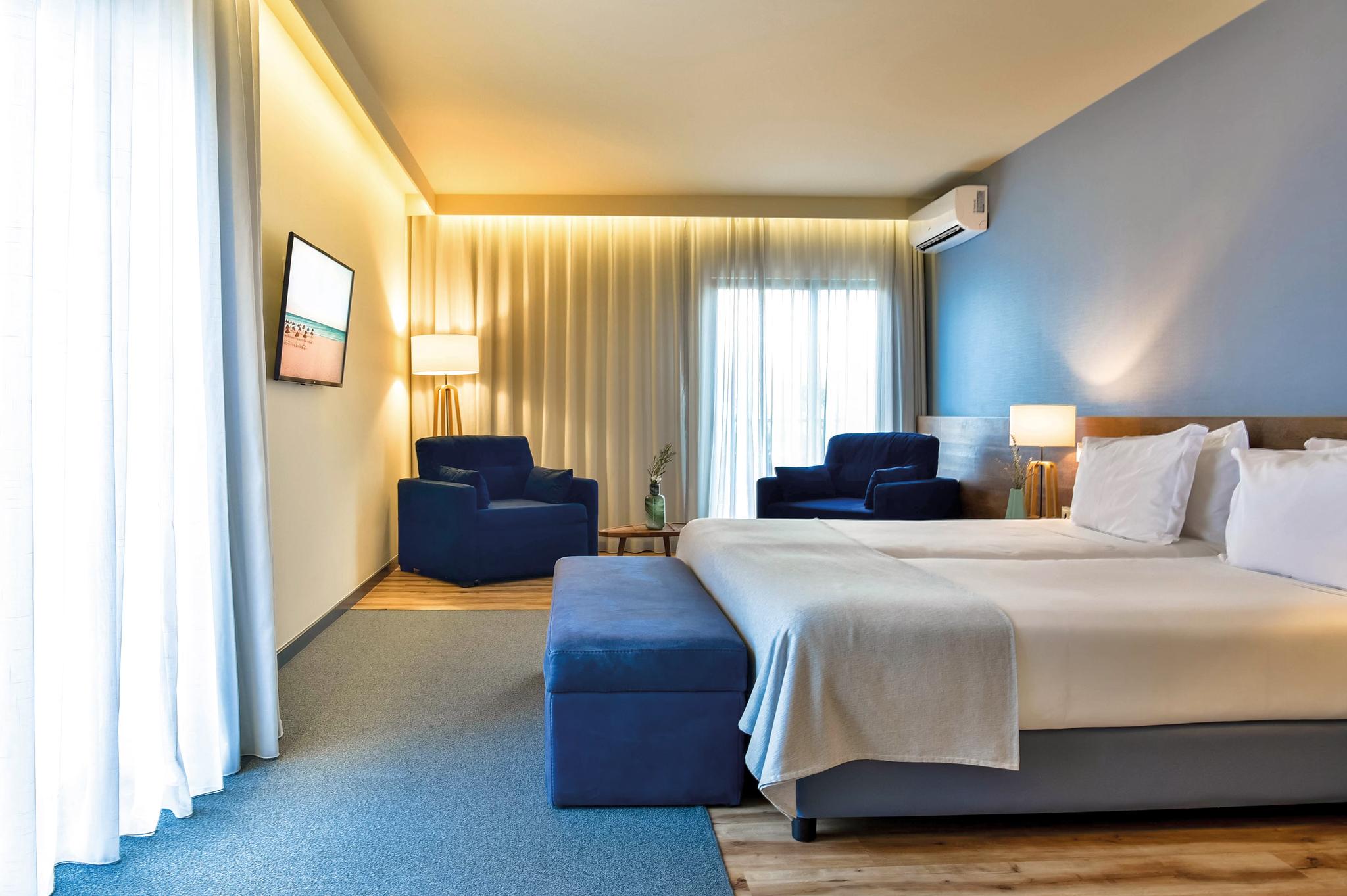 Spacious double bed room at The Prime Energize Monte Gordo