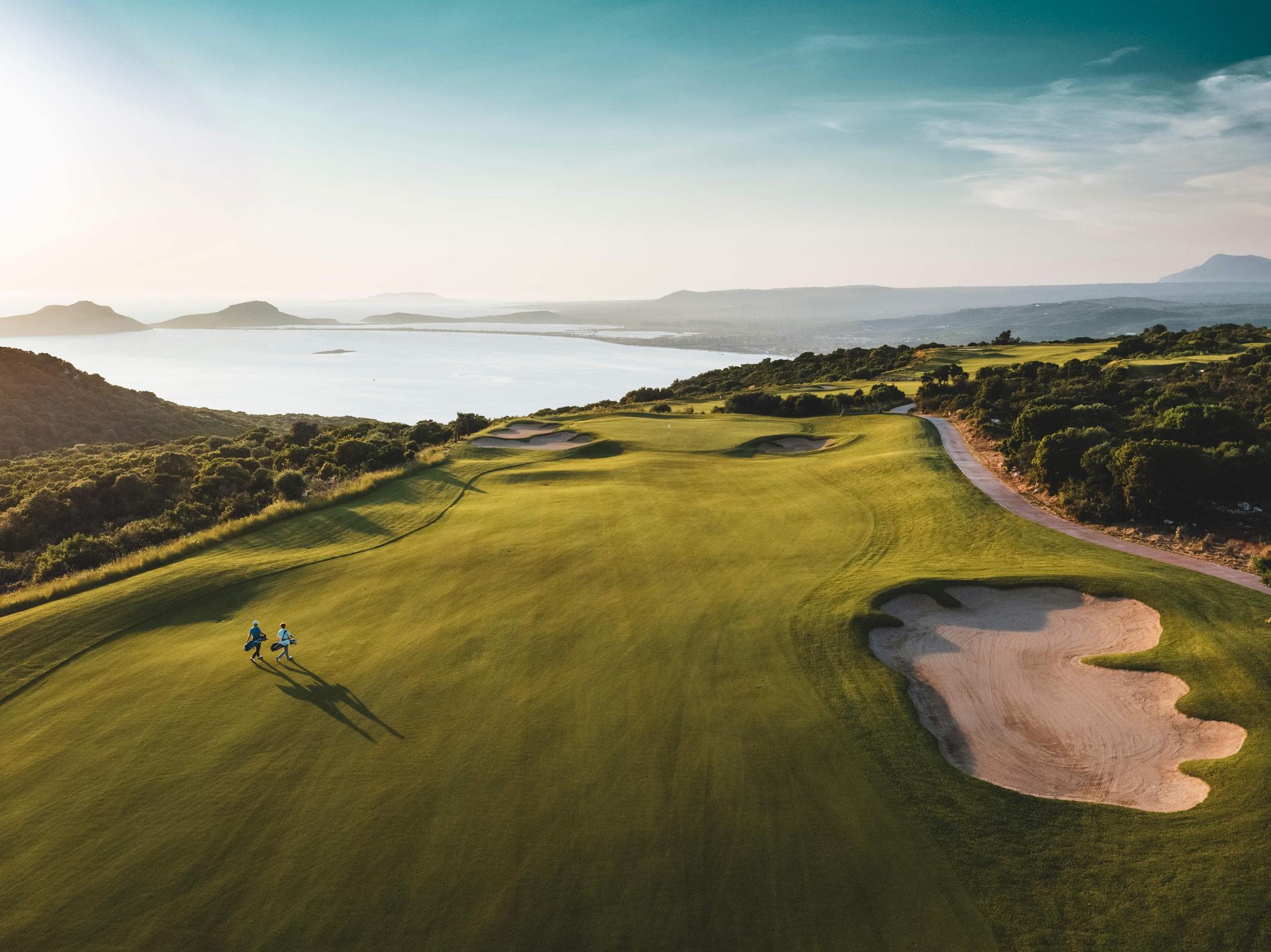 Well maintained fairway with a sand bunker