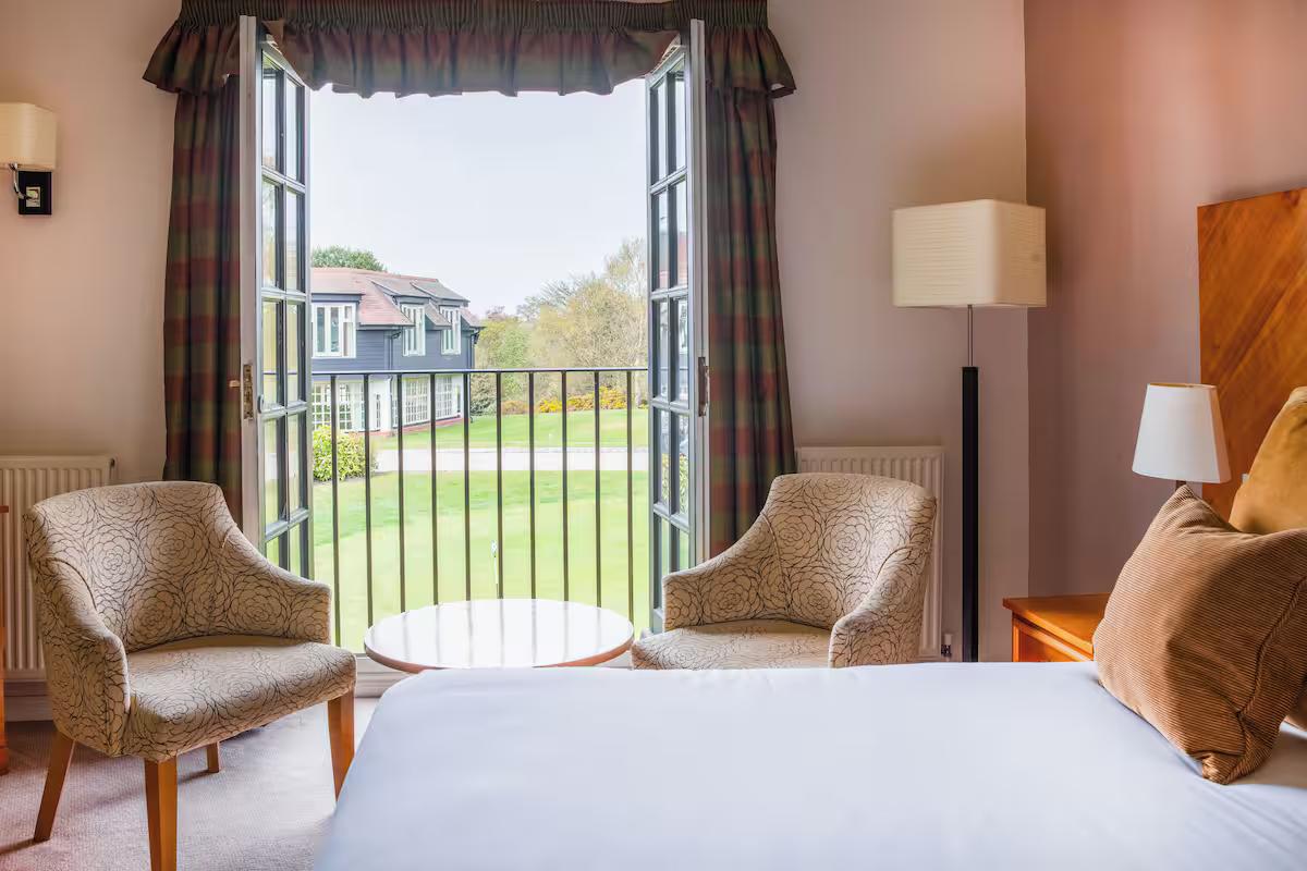 Double bed suite with balcony views at the Thorpeness Golf Club & Hotel
