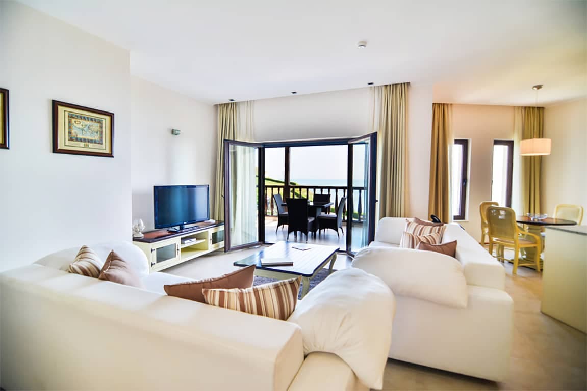 Living room as part of a suite at the Thracian Cliffs Golf & Beach Resort