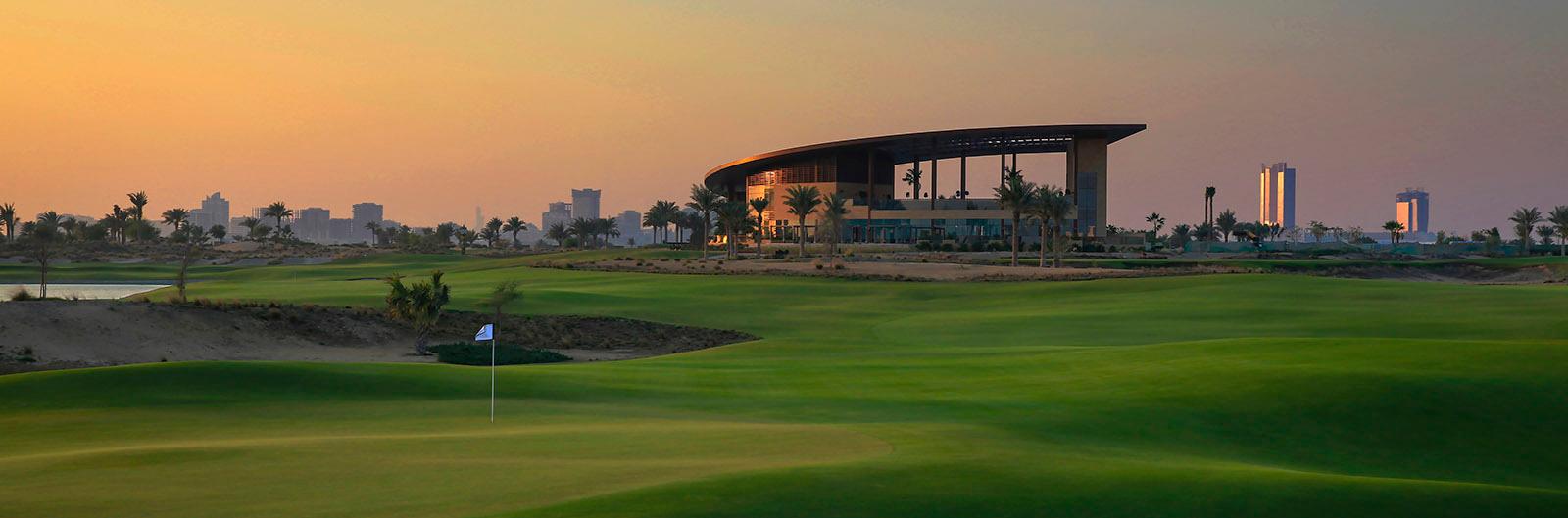 Panoramic view of the sun setting over the Trump International Golf Clubhouse