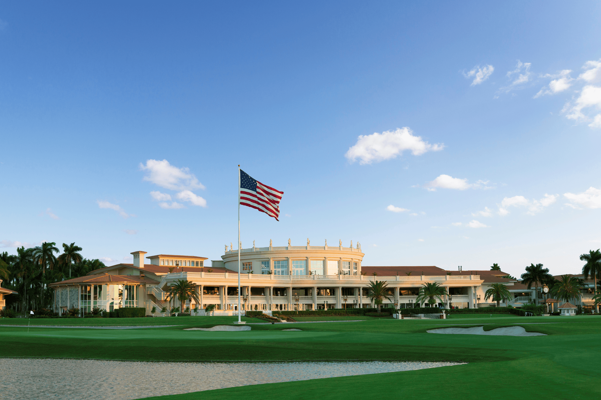 Panoramic view of the Trump National Doral clubhouse with the American flag flying tall