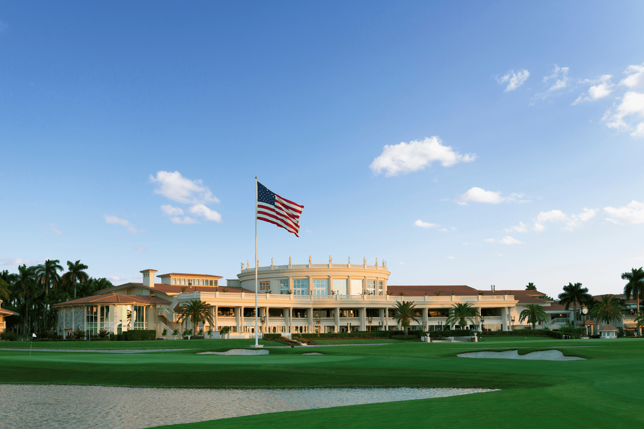 Panoramic view of the Trump National Doral clubhouse with the American flag flying tall