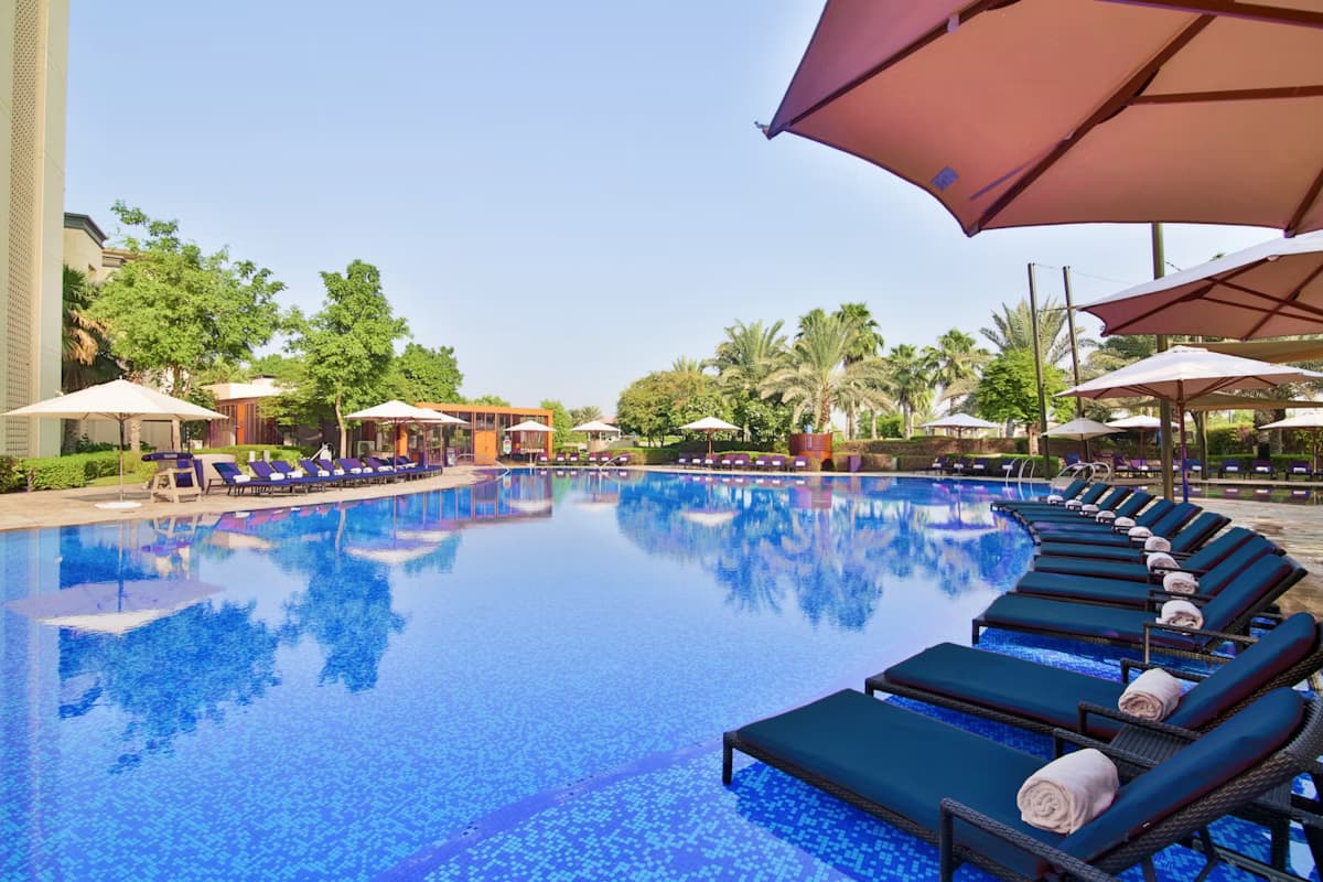 Outdoor swimming pool at VOGO Abu Dhabi Golf Resort & Spa