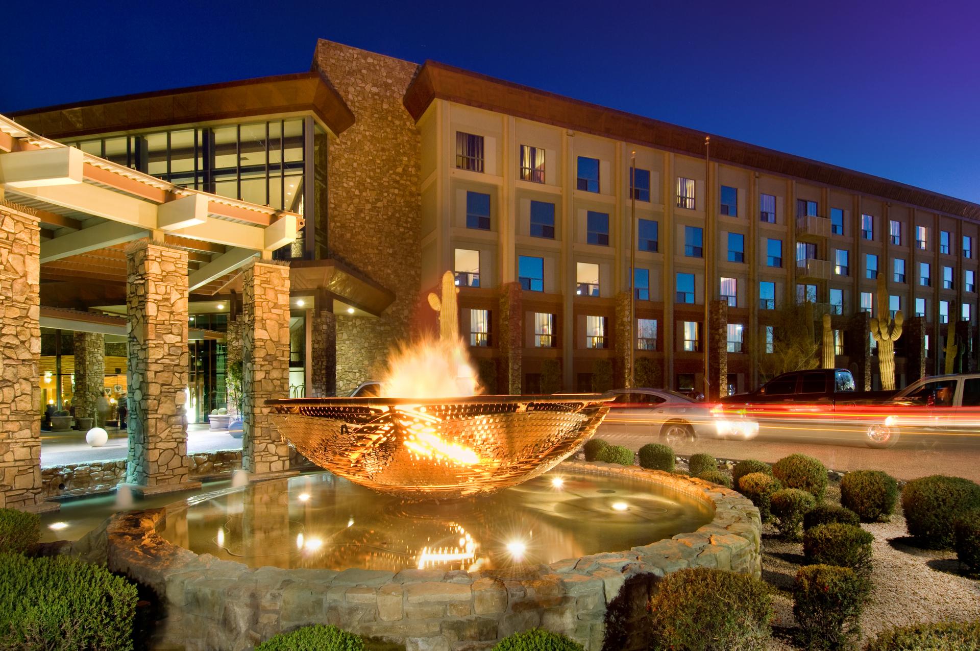 Front entrance with a fire sculpture at the We-Ko-Pa Resort