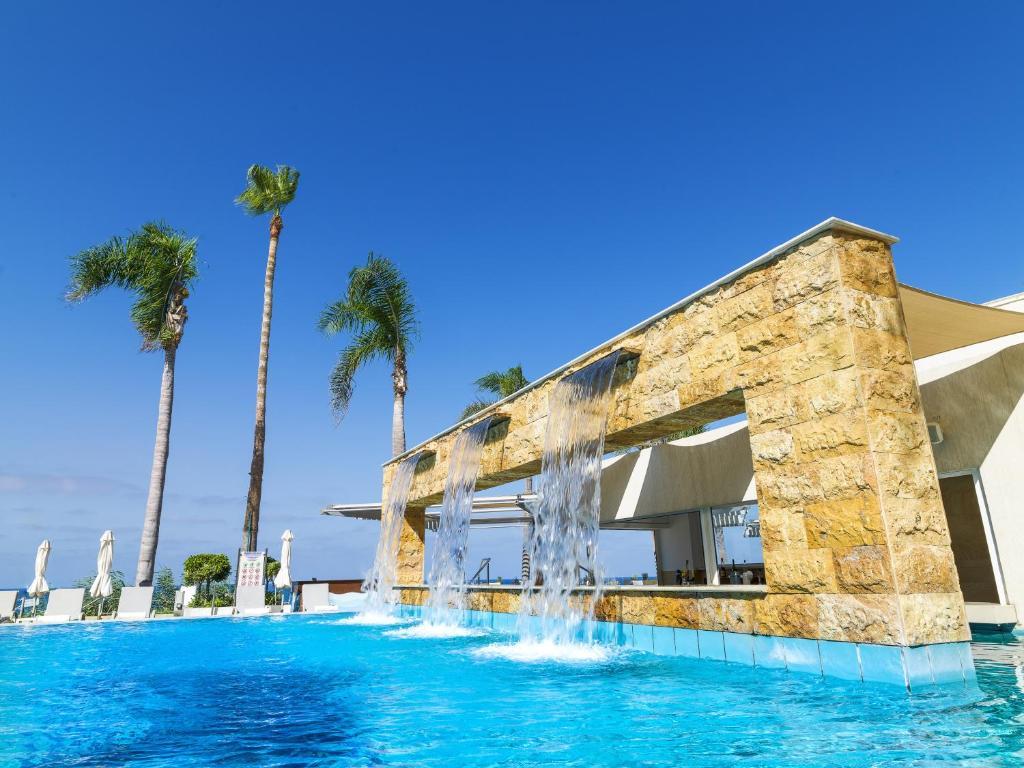 Outdoor swimming pool at Alexander The Great Beach Hotel