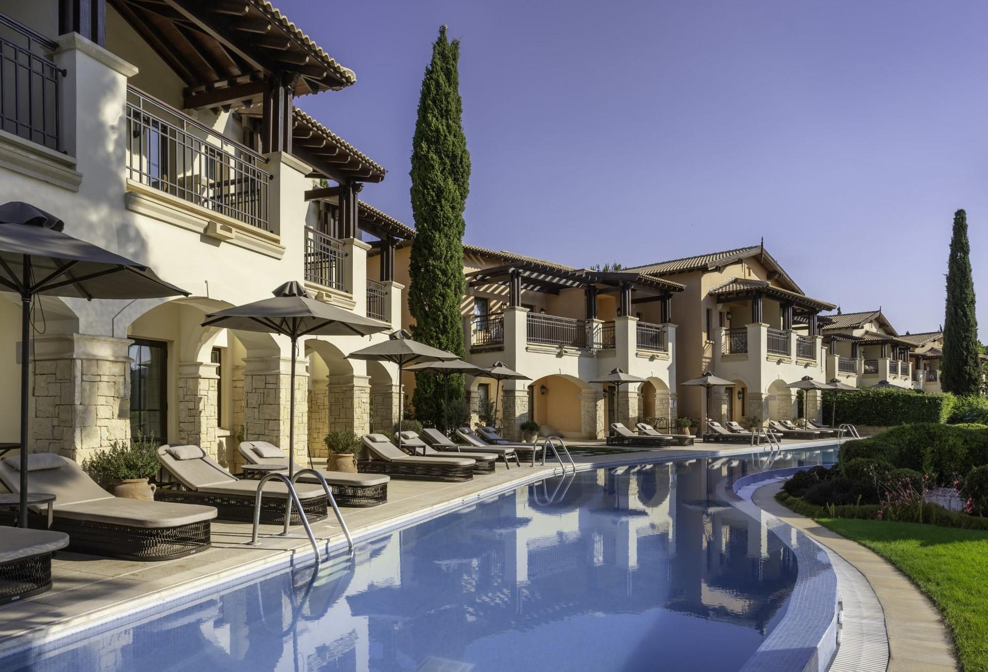 Lazy river running besides villas at Atlantica Aphrodite Hills Hotel
