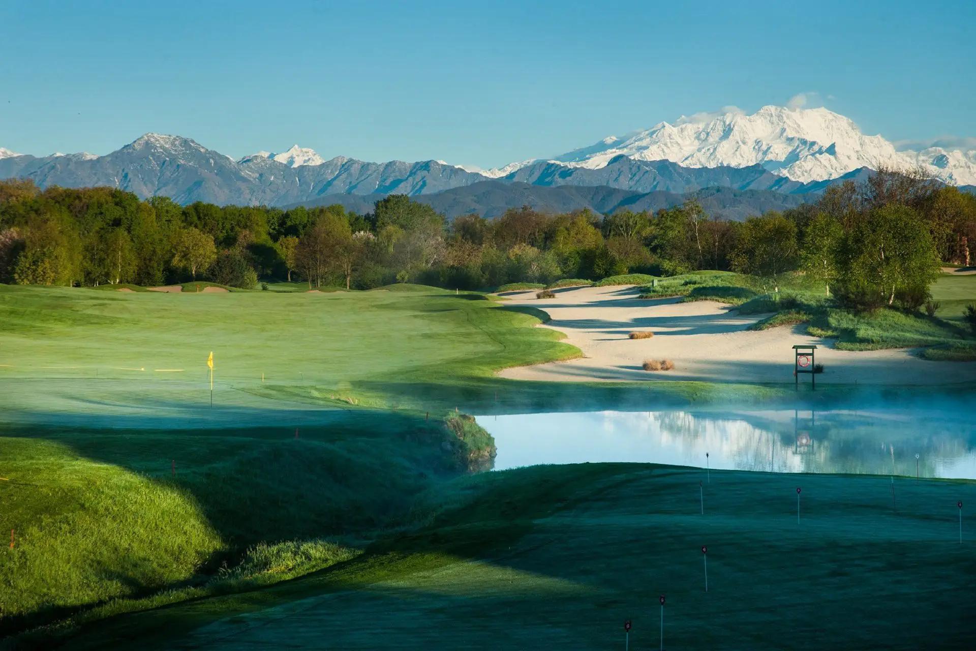 A well maintained fairway leading to a smooth green