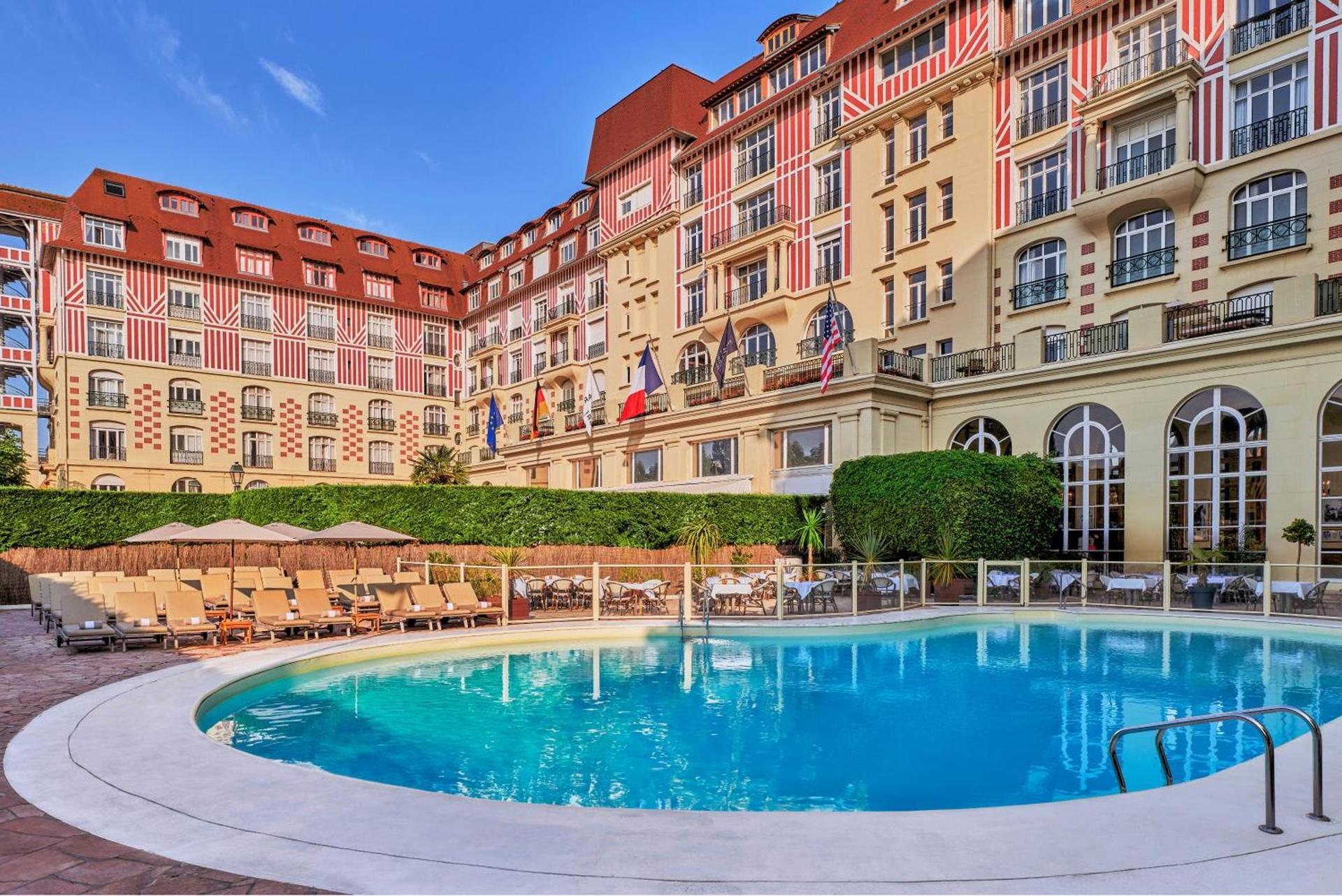 Outdoor swimming pool at the Hotel Barriere L'Hotel du Golf