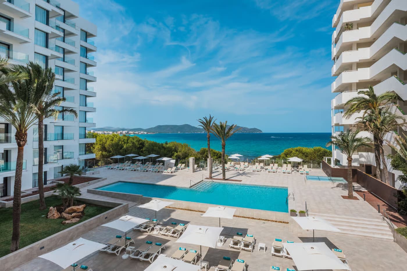 Overhead view of the outdoor swimming pool at Iberostar Waves Cala Millor