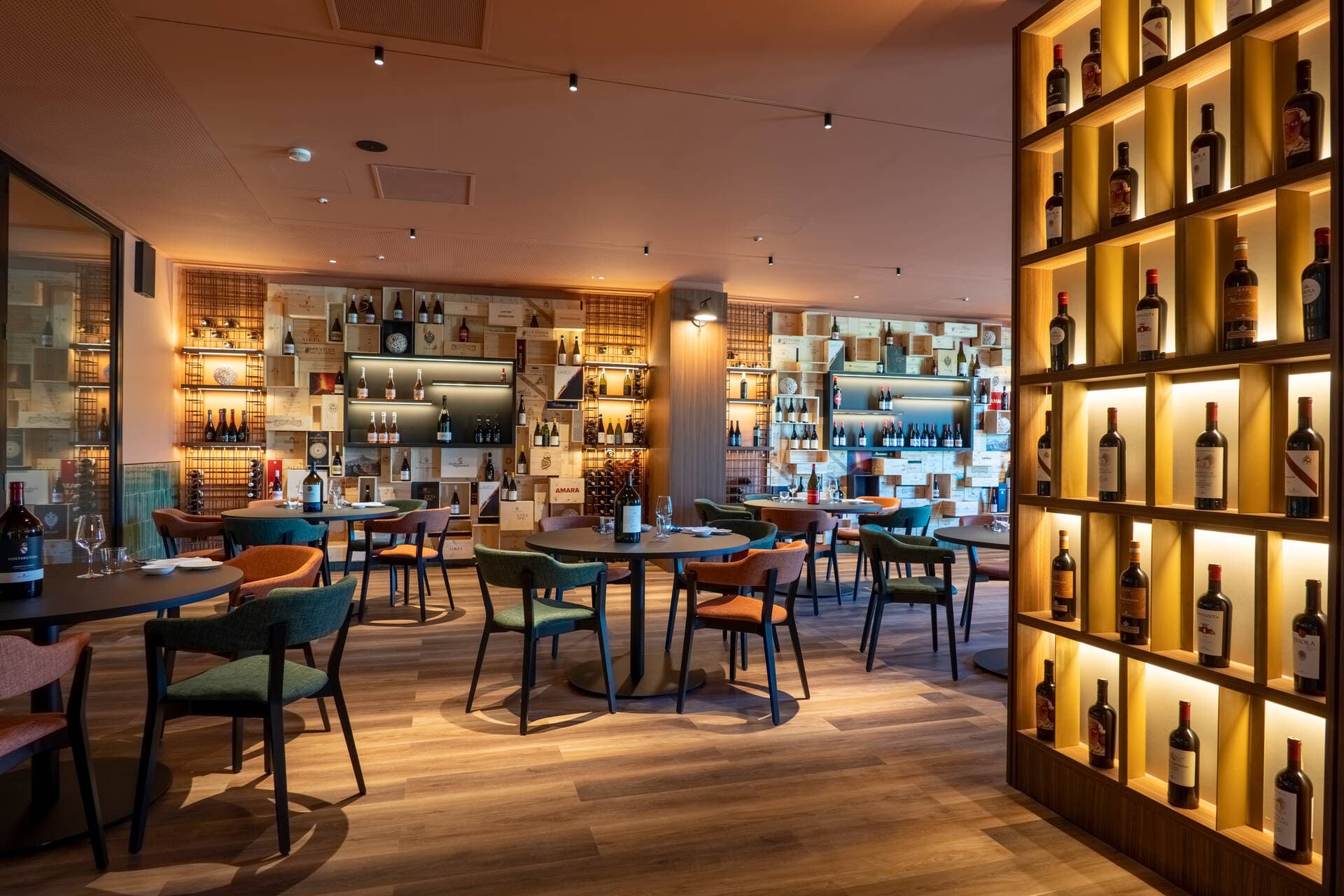Dining room designed with whine glasses at Il Picciolo Etna Golf Resort & Spa, Curio Collection by Hilton