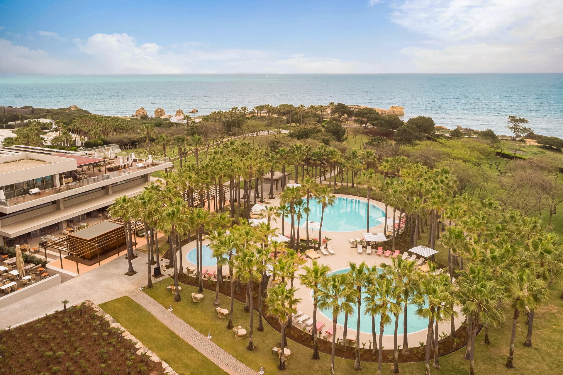 Overhead view of the outdoor pool at Kimpton Atlantico Algarve
