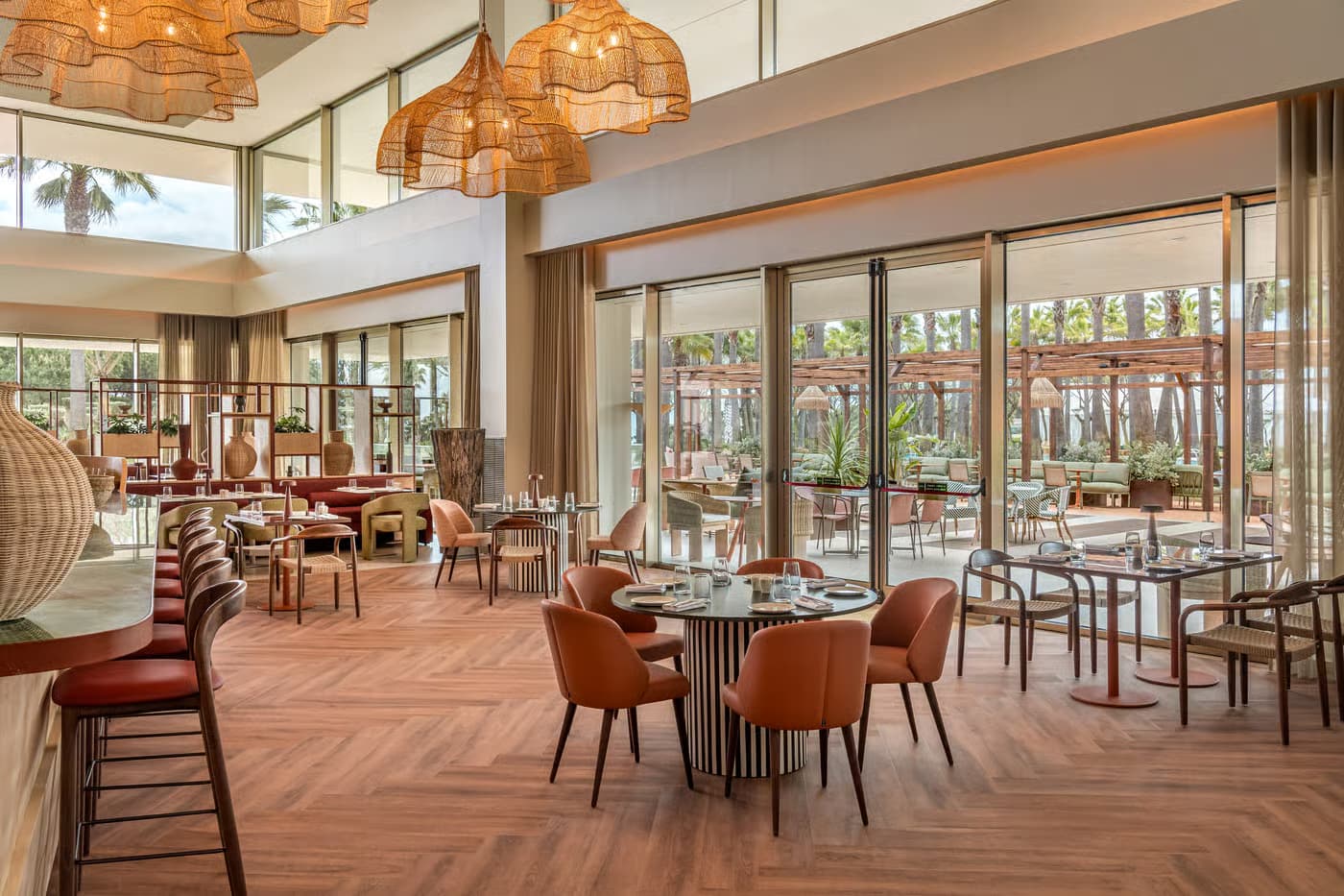 Indoor dining area and bat at Kimpton Atlantico Algarve