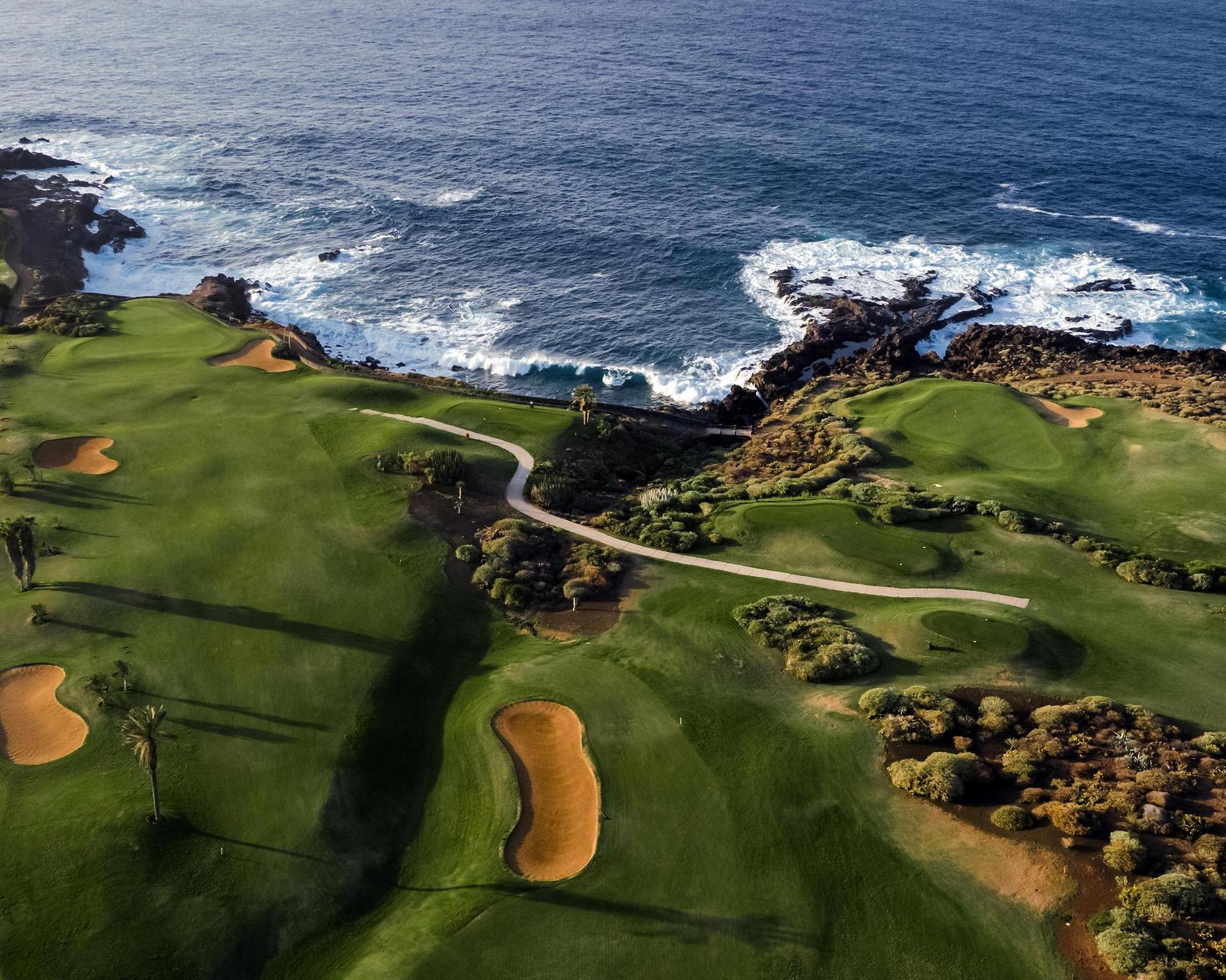 Overhead view of the coastal fairways nestled with sand bunkers at Melia Hacienda Del Conde