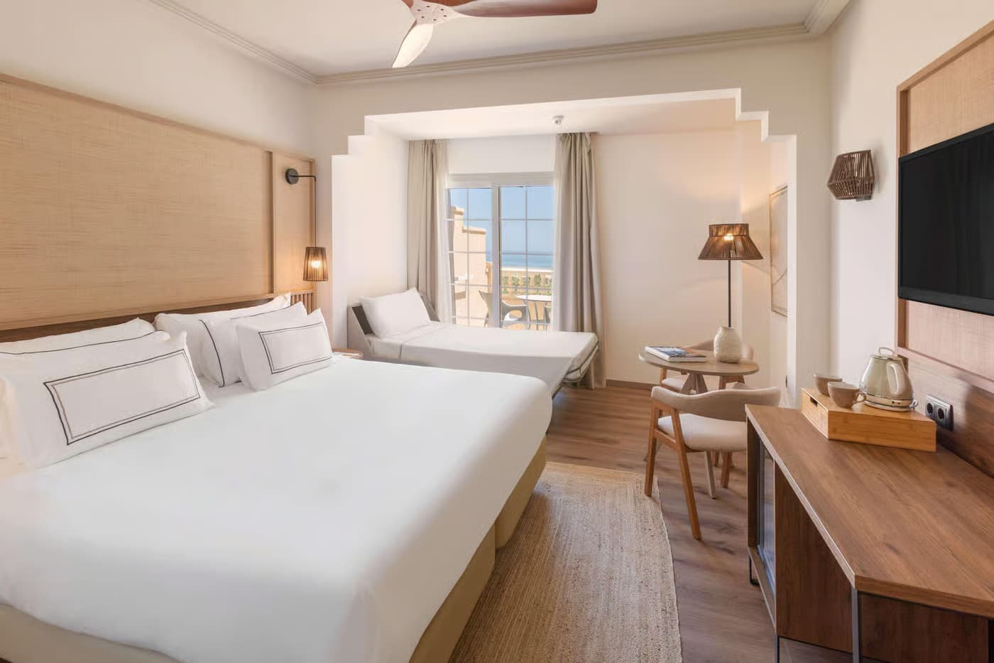 Double bed room with sofa bed at Melia Isla Canela