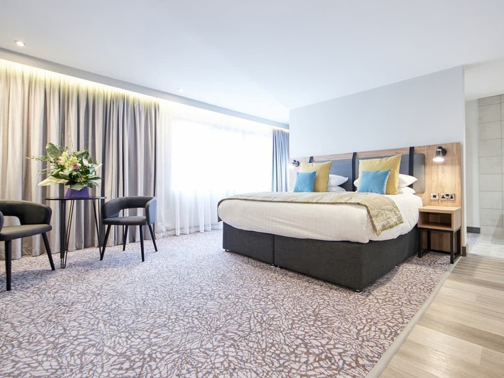Spacious double bed suite at Mercure George Washington Hotel Golf and Spa