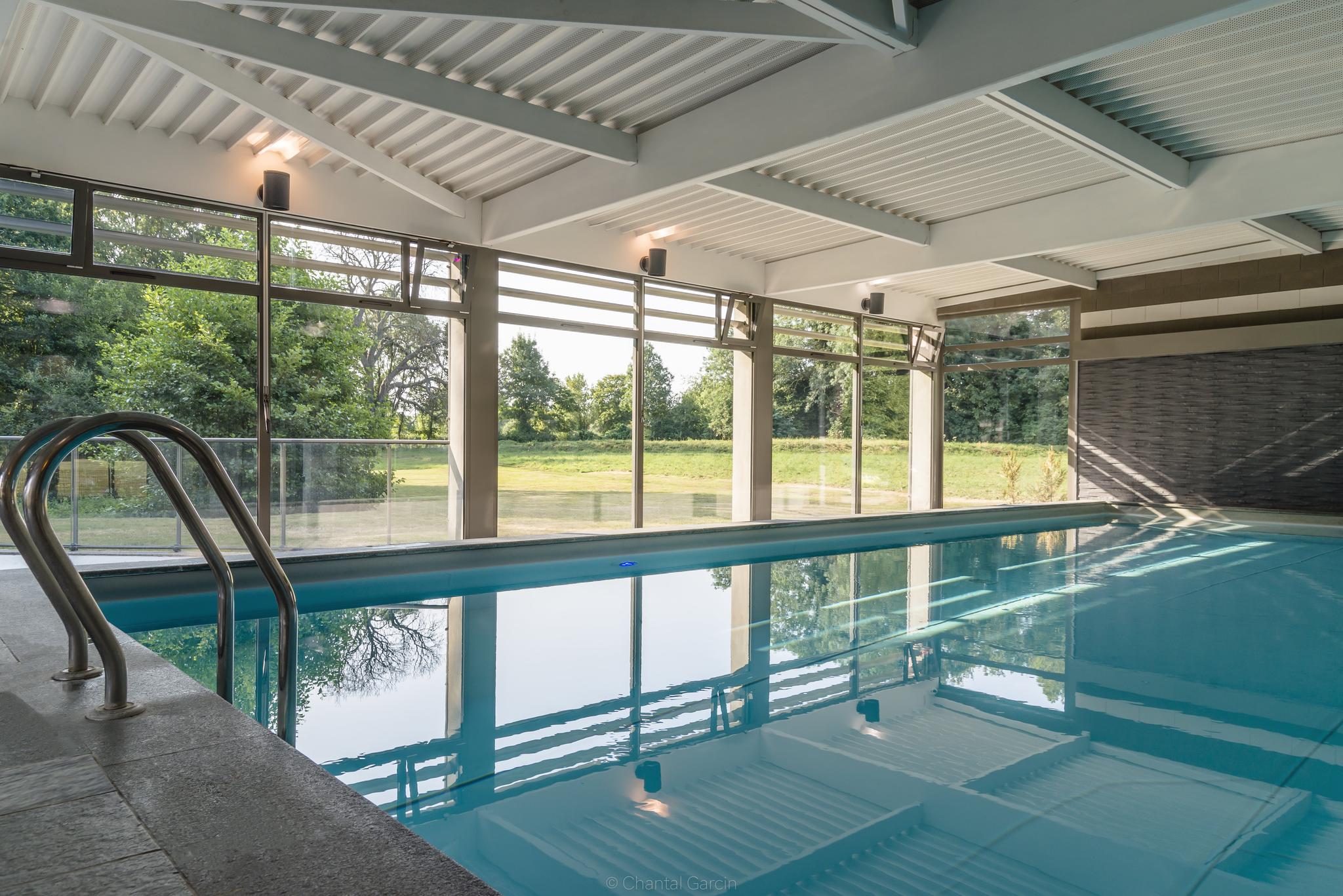 Indoor swimming pool at Najeti Chateau Tilques