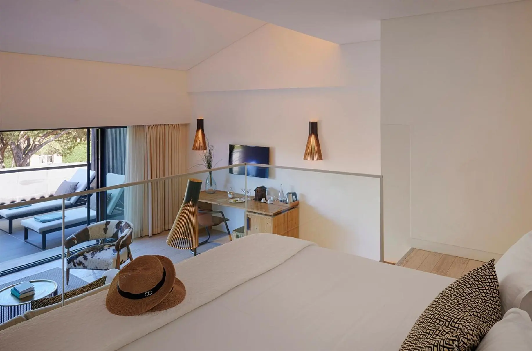 Double bed suite with balcony views at Octant Hotel Praia Verde