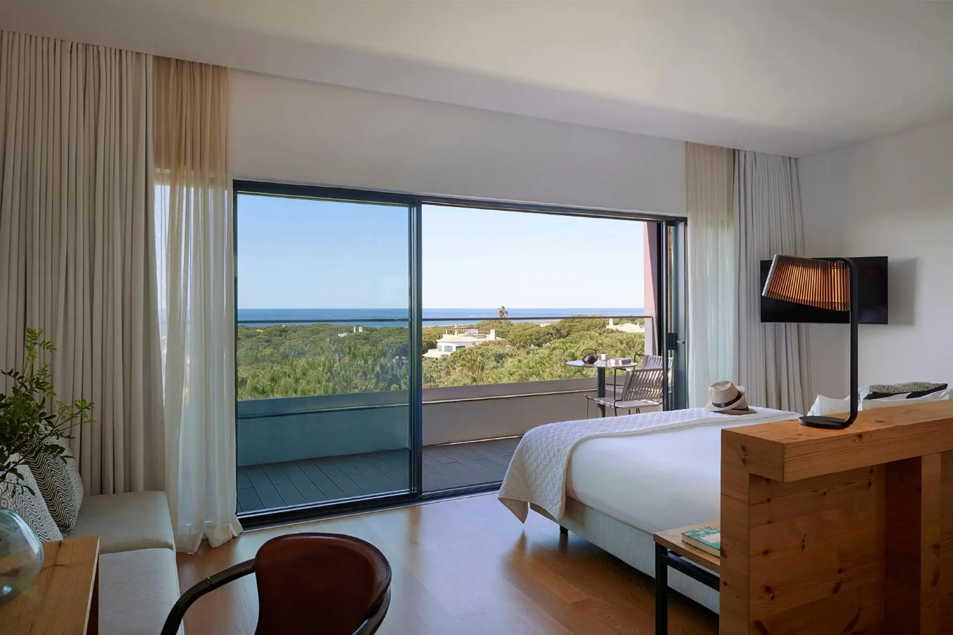 Double bed suite at Octant Hotel Praia Verde