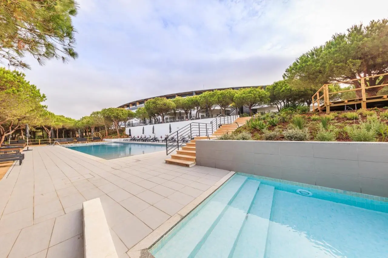 Outdoor swimming pool at Octant Hotel Praia Verde