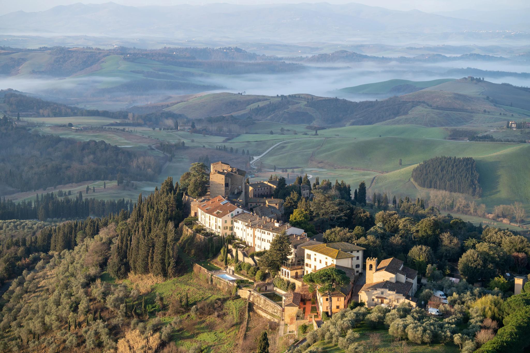 Aerial view of the hilltop Toscana Resort Castelfalfi