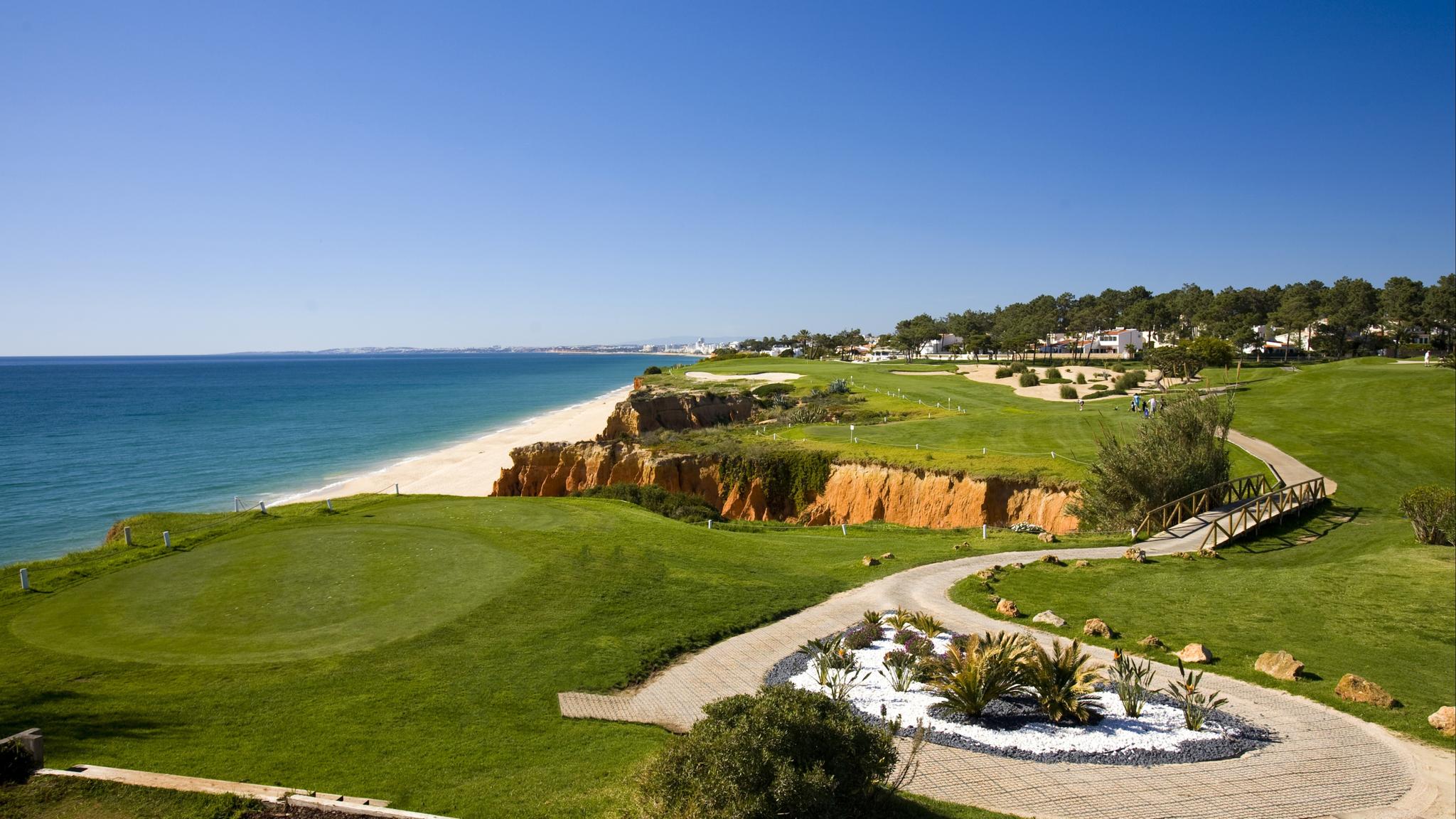 Overhead view of a coastal green with ocean views