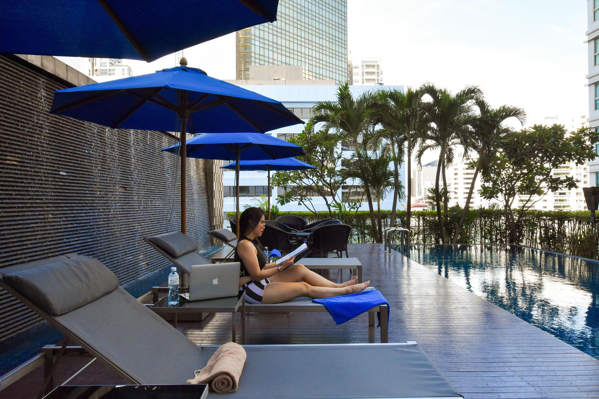 Outdoor swimming pool at Hilton Bangkok Grande Asoke