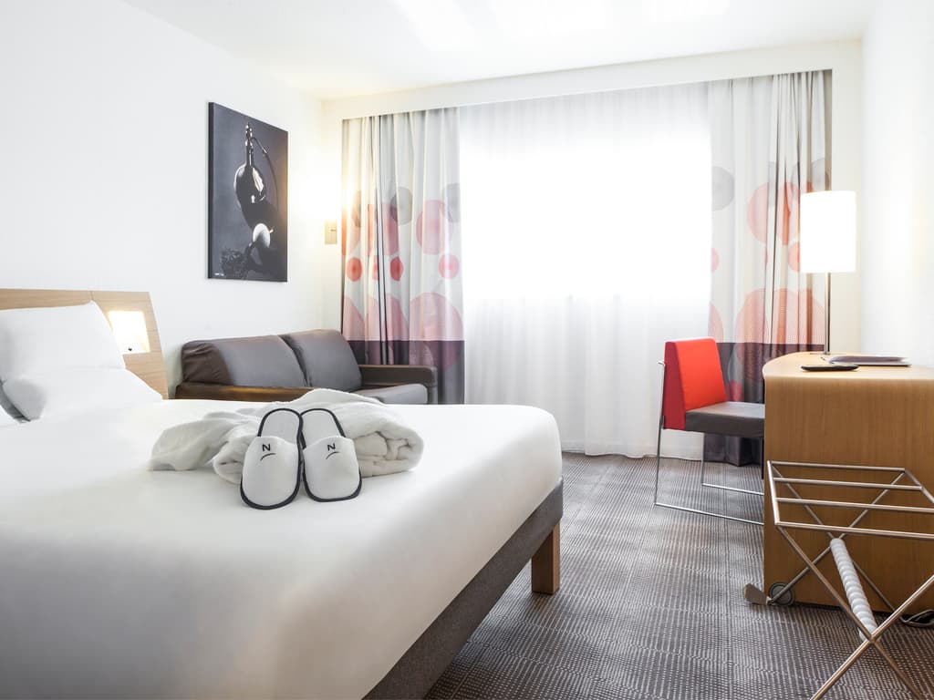 Double bed suite at Novotel Saint Quentin en Yvelines