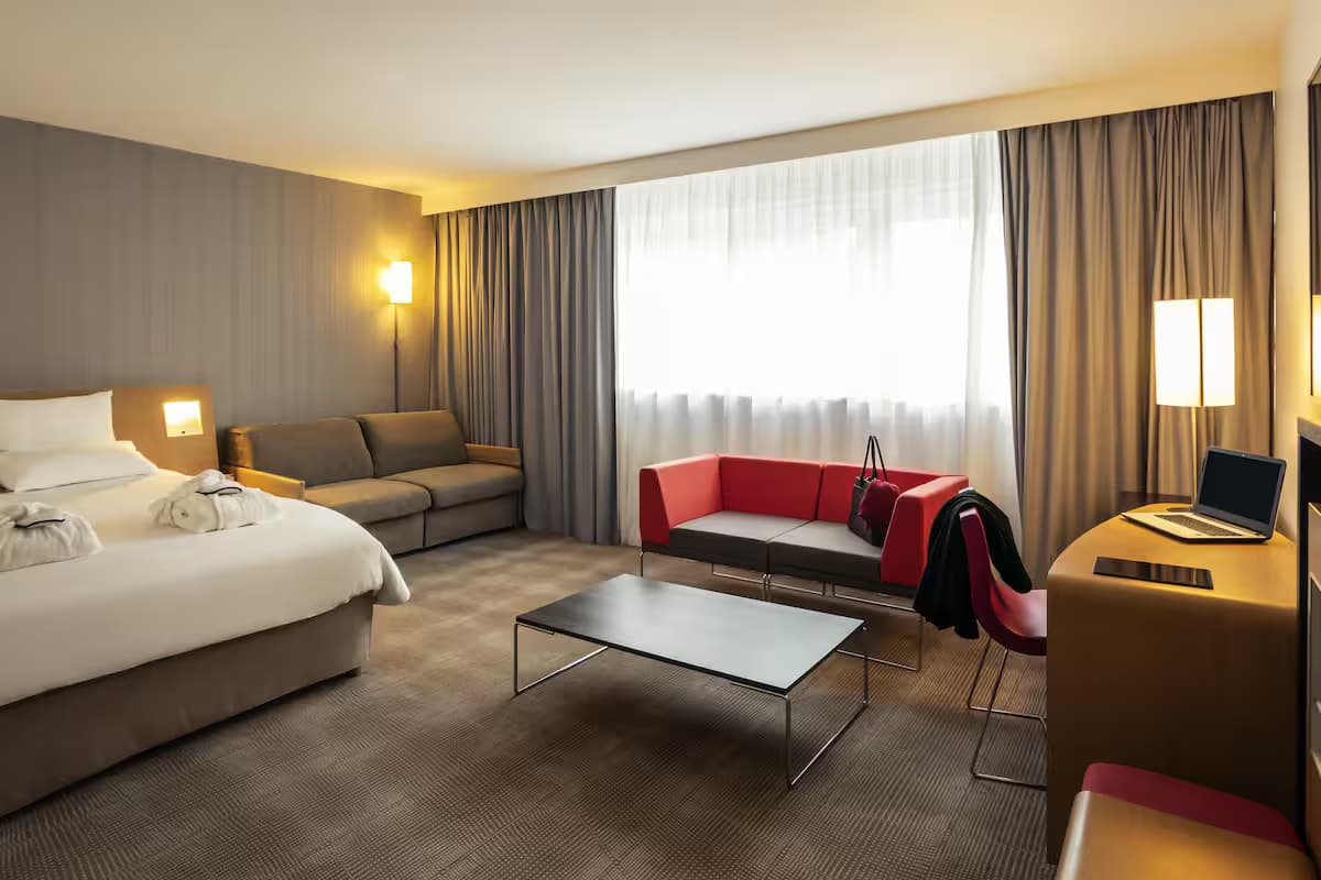 Spacious double bed suite at Novotel Saint Quentin en Yvelines