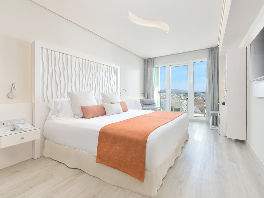 Double bed suite with balcony views at Amàre Beach Hotel Marbella